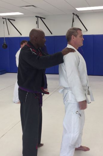 Brazilian Jiu-Jitsu Self-Defense Grabbing Shoulders From Behind